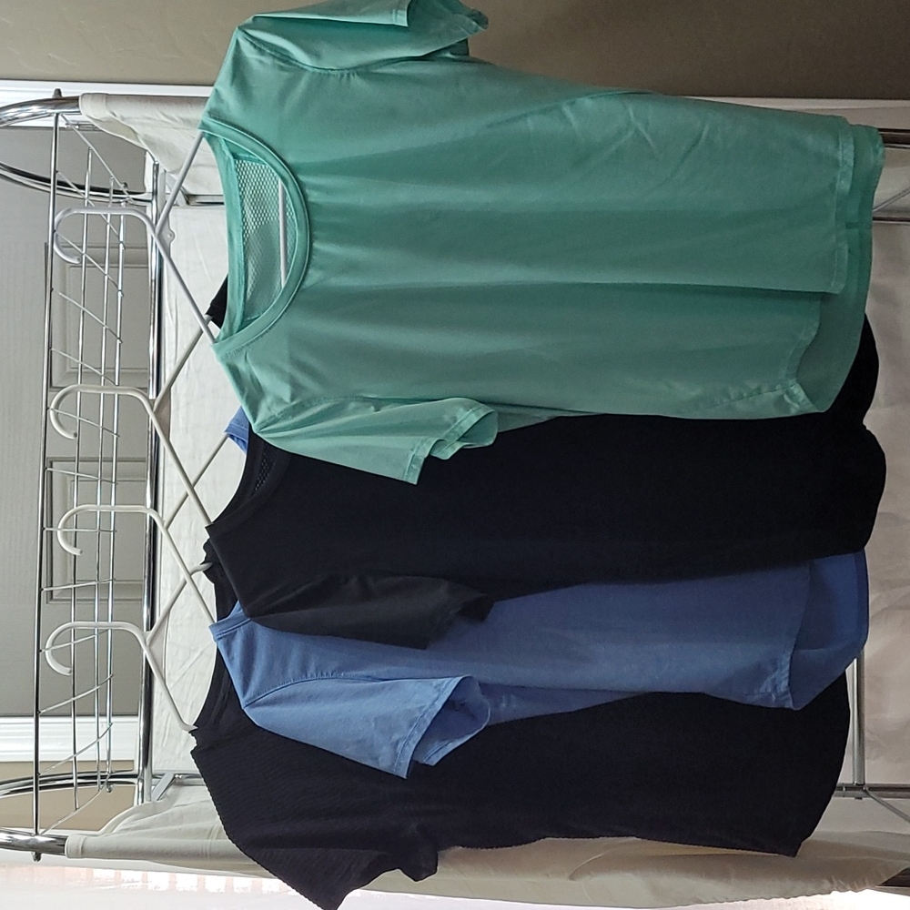Womens sport shirts lot of 4. Size medium